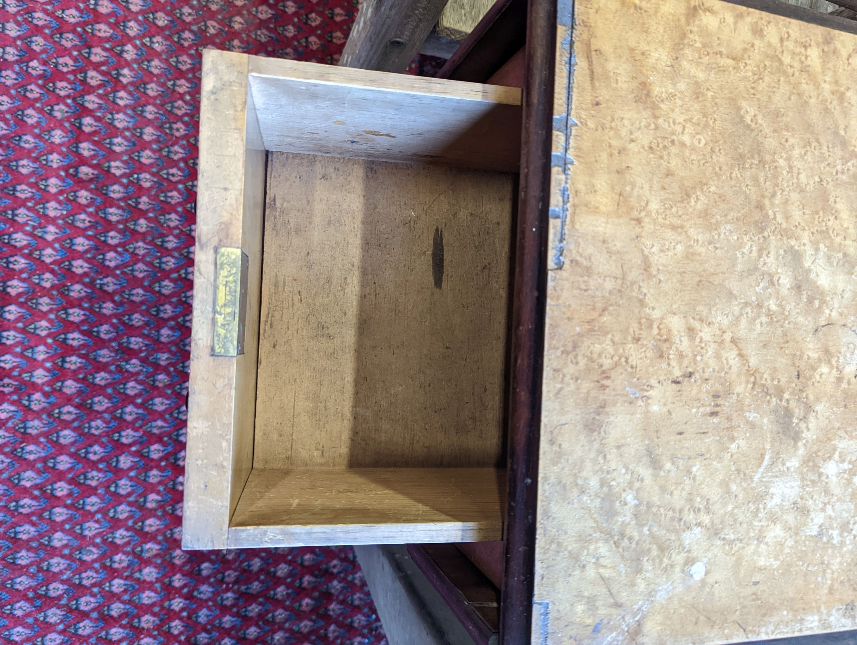 A 19th century Continental bird's eye maple drop flap work table, width 38cm, depth 53cm, height 74cm